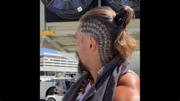 
Jason Momoa Reveals New Head Tattoo After Shaving Off His Long Hair 