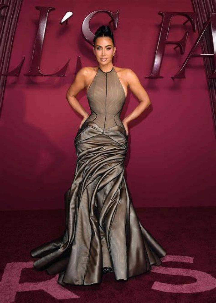 
Khloé Kardashian Wears Abs-Baring Gown as She Joins Kim Kardashian (Dressed in Vinyl!) at CFDA Awards 