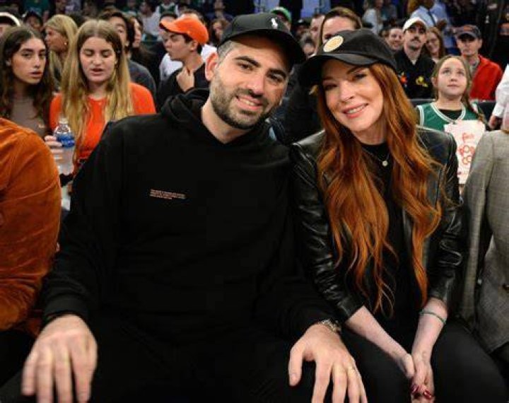 
Lindsay Lohan and Husband Bader Shammas Smile as They Sit Courtside at New York Knicks Game 
