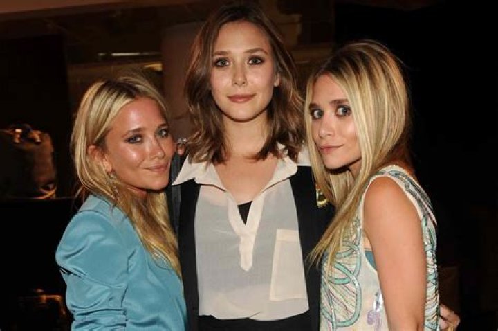 
Mary-Kate and Ashley Olsen Are All Smiles at The Row’s Paris Fashion Week Presentation 