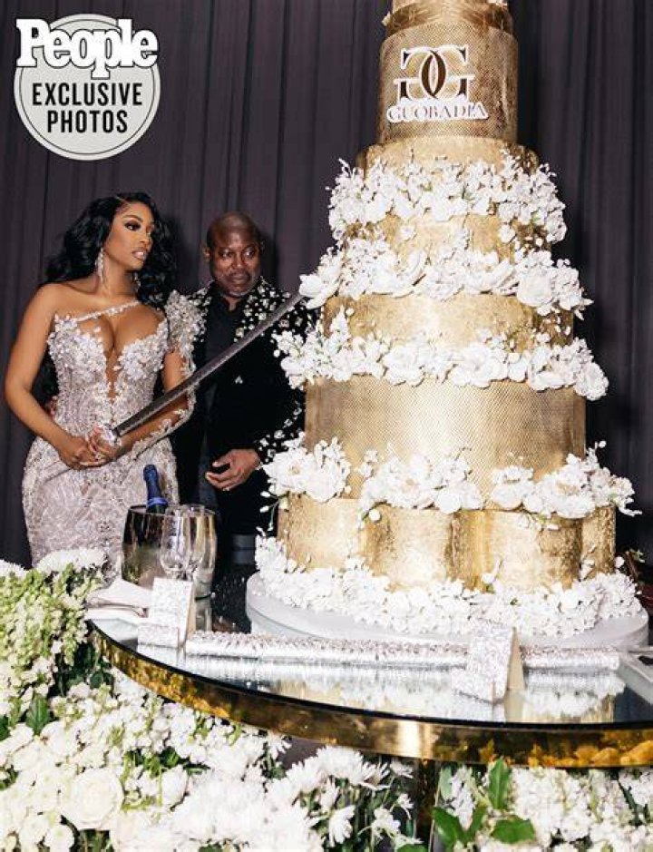 
Porsha Williams Needed a Sword to Cut into Her 10-Tier Wedding Cake with Husband Simon Guobadia 