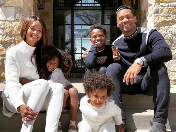 
Russell Wilson Is ‘Officially in the Doghouse’ After He and Ciara Face Off in ‘Carpool Karaoke’ Teaser 