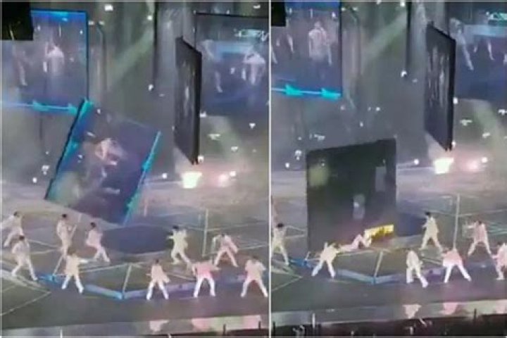 
video footage of a giant screen falling during a concert in Hong Kong featuring Mirror Boy Band 